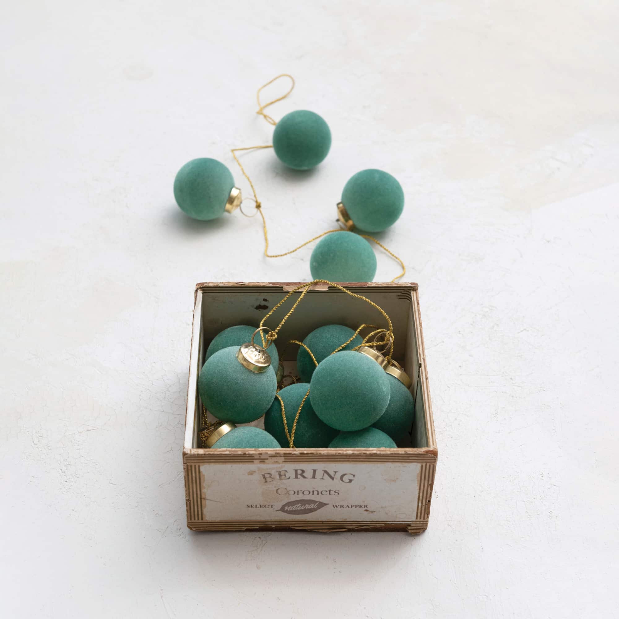 Hello Honey® 6ft. Mint Flocked Glass Ball Ornament Garland